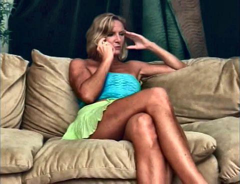 A mature blonde bombshell licks a cock and sucks cum in her mouth