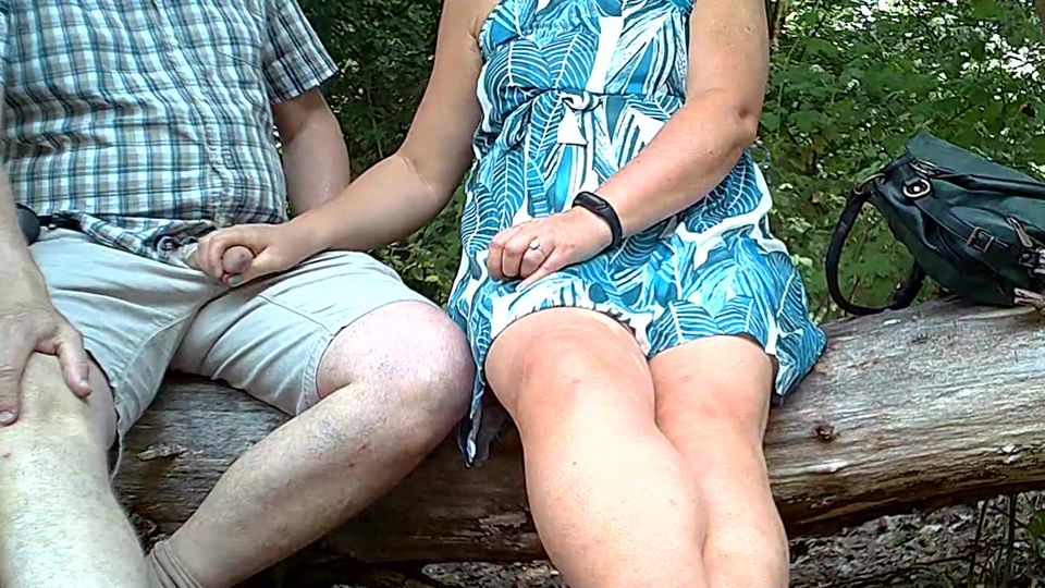 Handjob outdoors in the park in hot weather