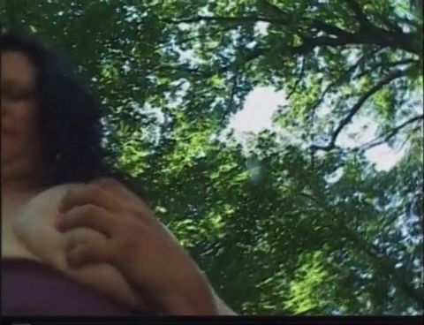 Mature brunette with big tits fucks outdoors