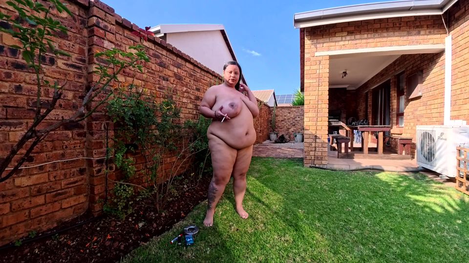 Smoking naked outside, displaying my fat brown body, body writing