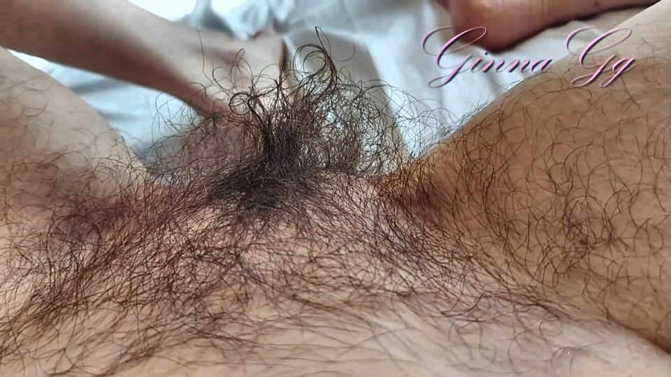 An Extremely Hairy Brunette Finger Masturbates a Pussy From Which Big Labia Stick Out MILF Ginnagg