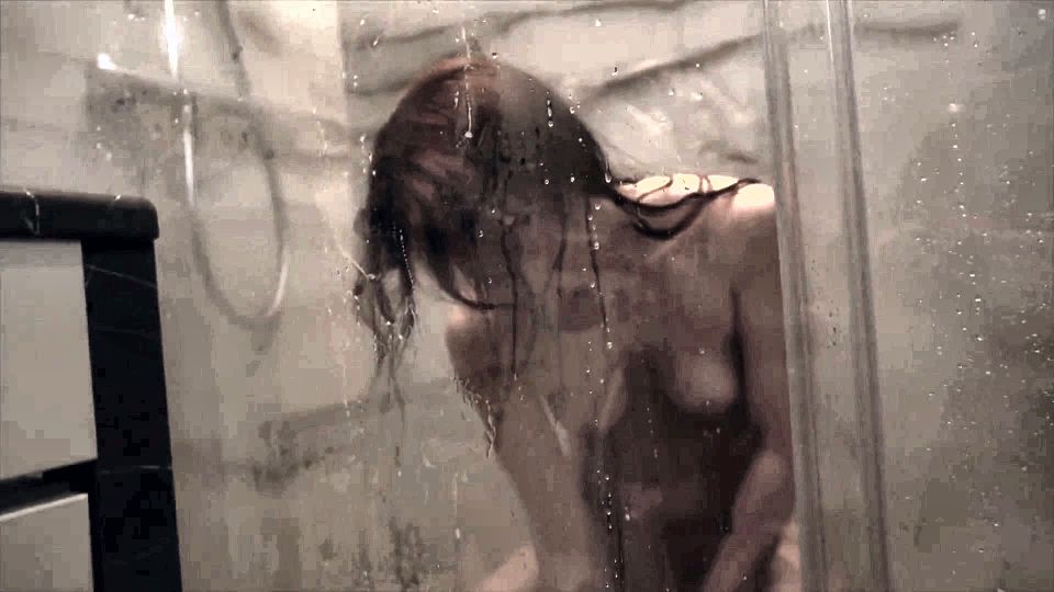 Red-haired Beauty Entertains Herself with Fingers and a Toy Friend in the Shower