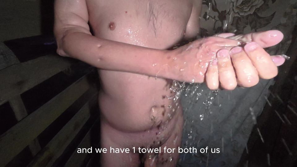 Soapy naked bodies in a rural shower