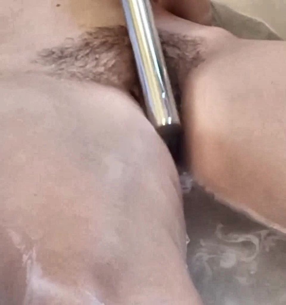 Shower head masturbation with hairy pussy