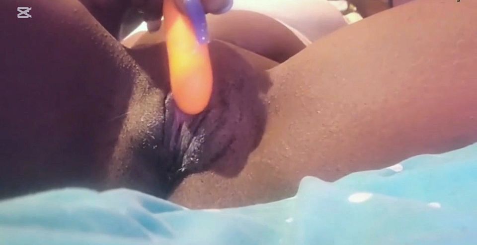 MILF Mia returns from the beach and masturbates her pussy.