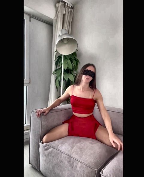 stretching -long legs -red short skirt