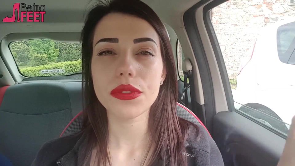 Good looking Petra smoking in her car