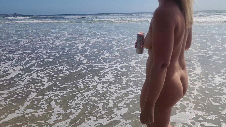 Playing at the nude beach.