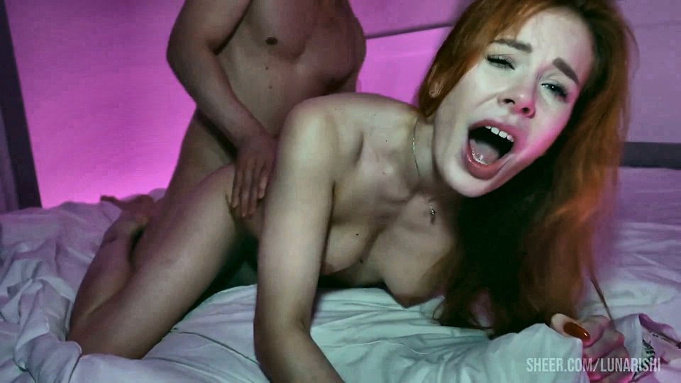 Neon-lit Homemade Video: Red-haired Hottie Takes in Huge Cock and Gets a Creampie