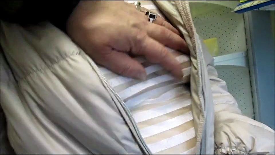 Touching tits in see-throu blouse in a market