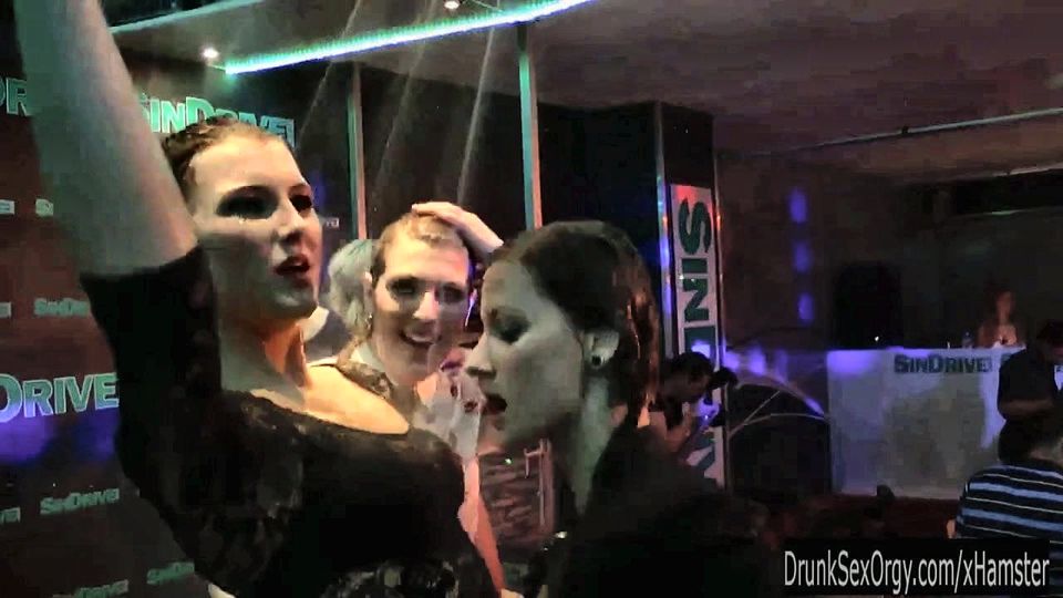 Wet girls dancing erotically in a club