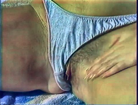 Classic mature blond plays with herself in the sunlight poolside
