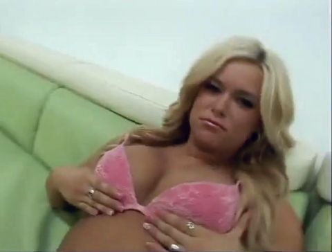 Busty blond whore getting cumshot on ass after sucking cock on the couch