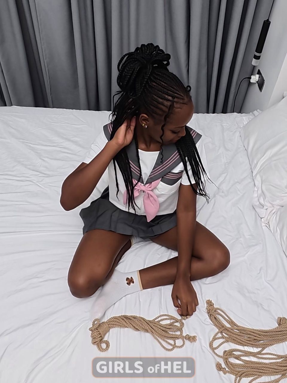 Petite ebony schoolgirl with tied up legs gives blowjob and takes dick up her pussy