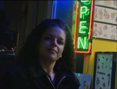 Fabulous brunette with curly hair wants a new tattoo