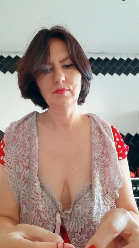She knitted herself red lace lingerie and tried it on