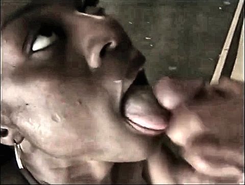 Sexy black babe loving it as she deepthroats white stud's huge cock