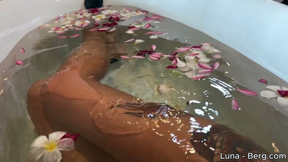Bath of Blossoms Naked MILF Masturbates Among Flowers