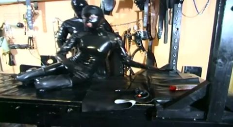 Extreme bondage for latex fetish slut