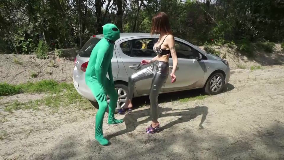 Suited slave gets punished outdoor from femdom chick