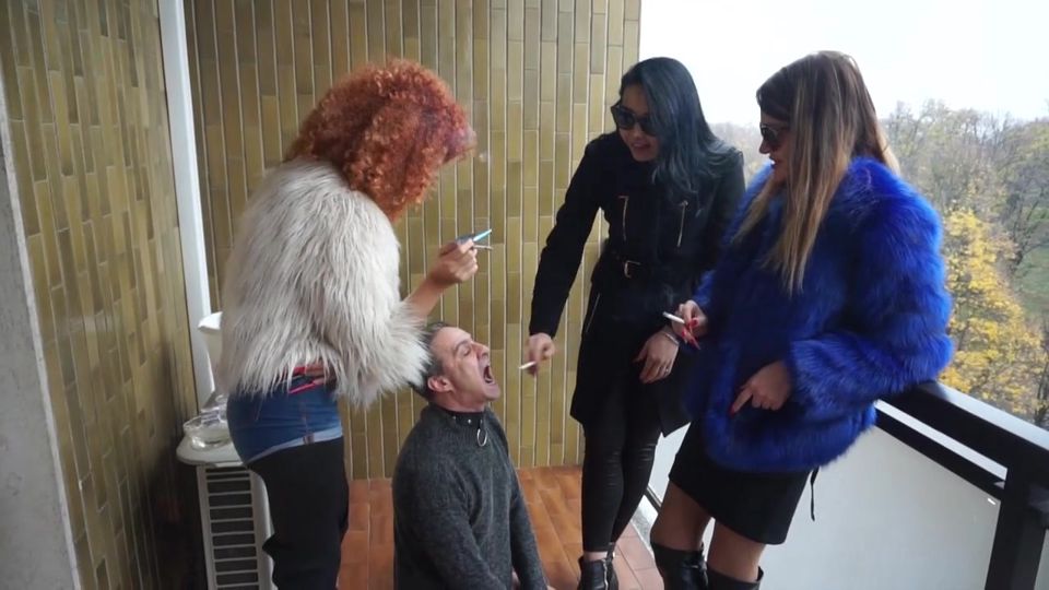 Three femdom chicks smoking and using him as ashtrey