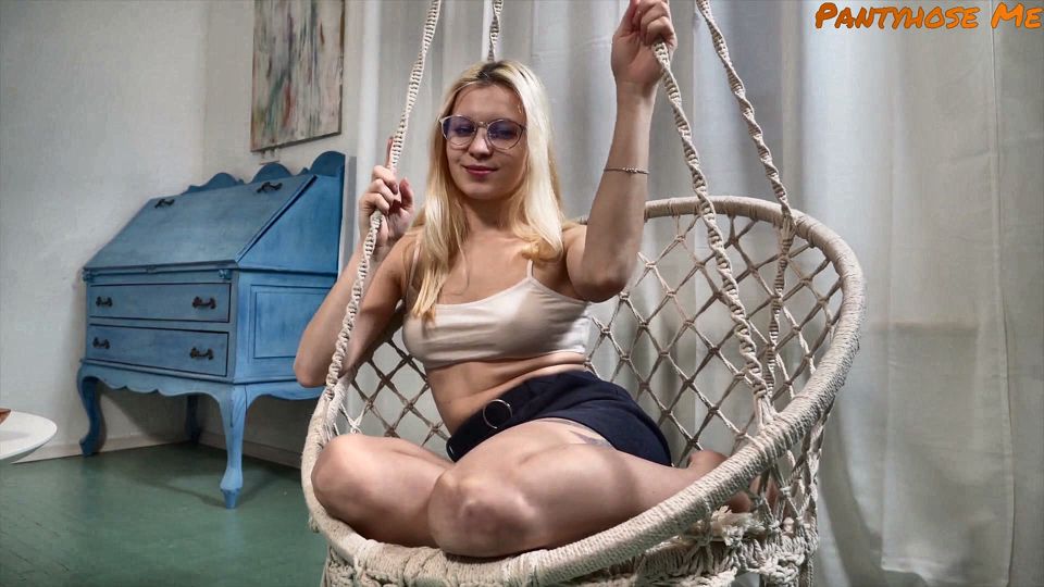 Kristina in the swing wearing nude crotchless pantyhose using a dildo sex toy